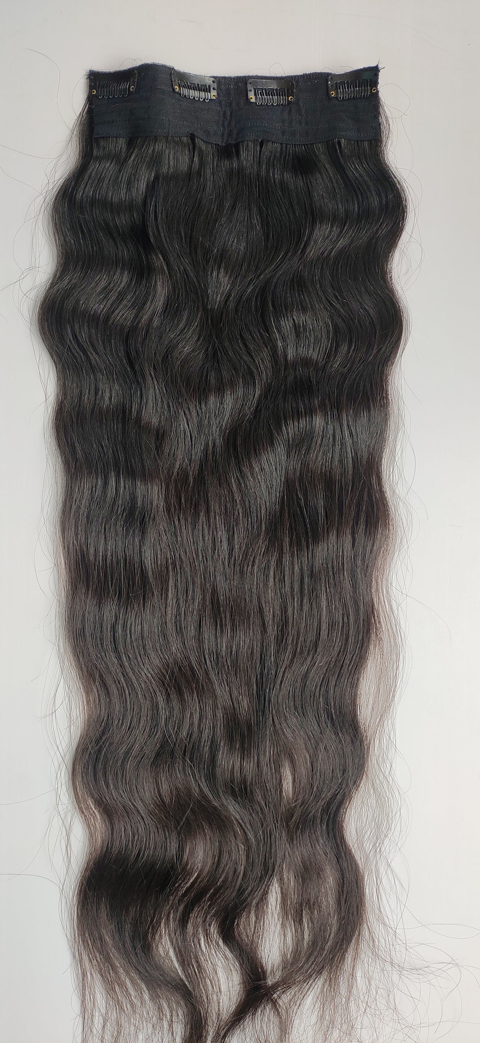 9 Piece Clip-In Extensions - Natural Wavy